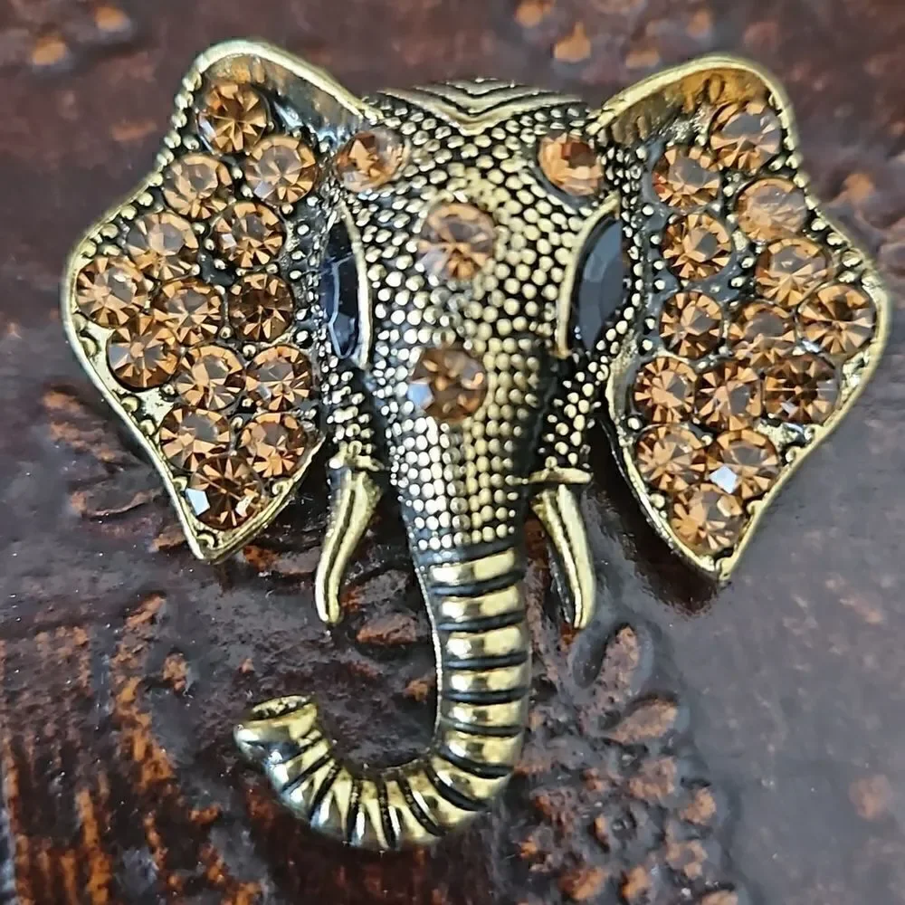 NWOT Gold tone crystal elephant brooch.